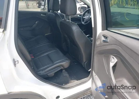 2015 Ford Escape Titanium z USA, uszkodzony, nr VIN 1FMCU0JX2FUC03241